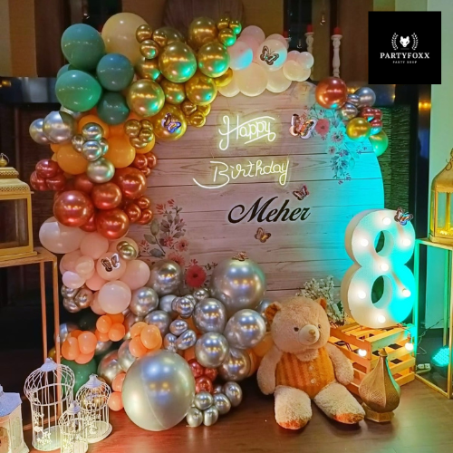 Whimsical wooden-Themed Balloon Backdrop for 8th Birthday Celebrations